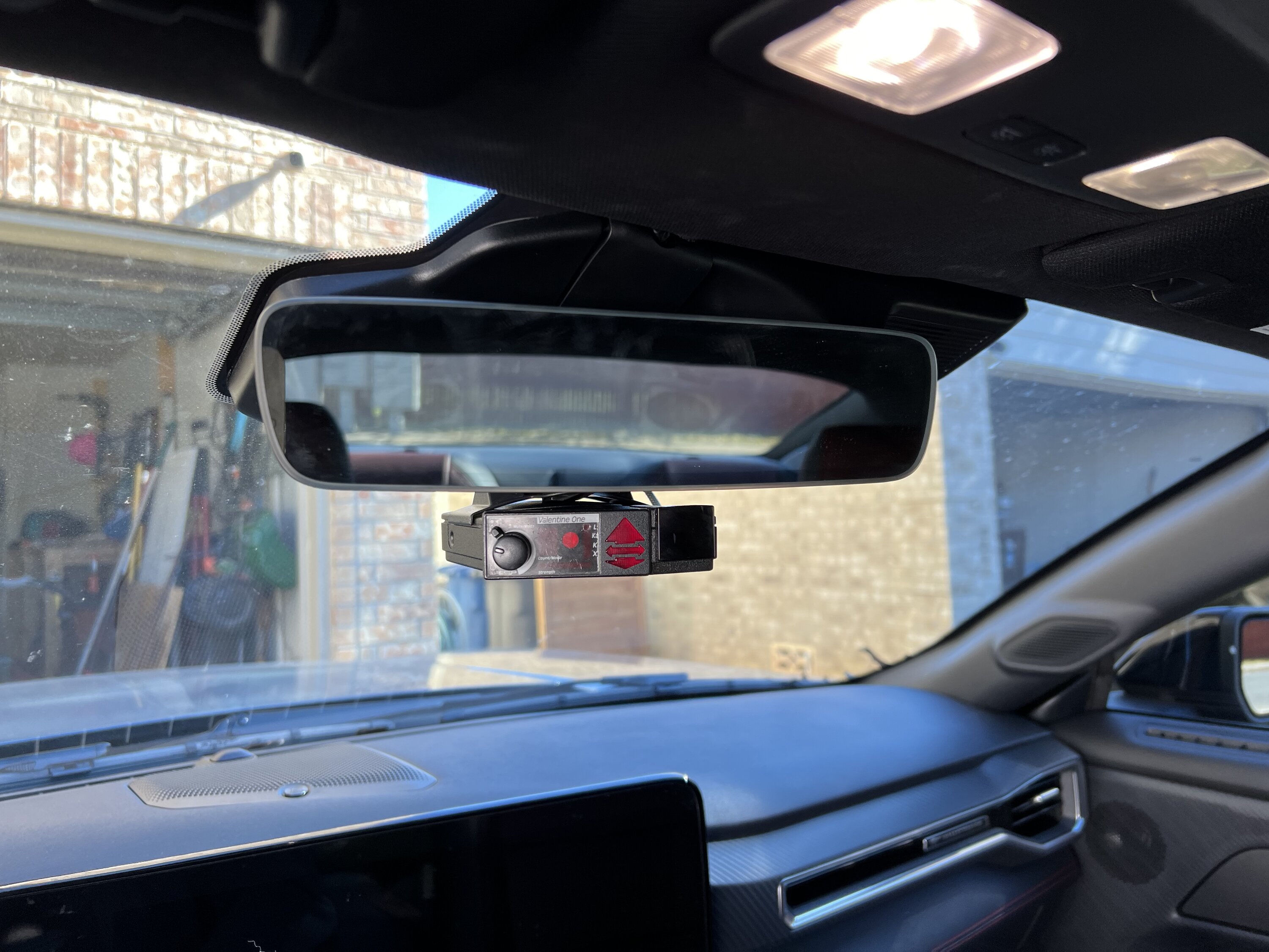 What is this on the rear view mirror?  MachEforum - Ford Mustang Mach-E  News, Owners, Discussions, Community